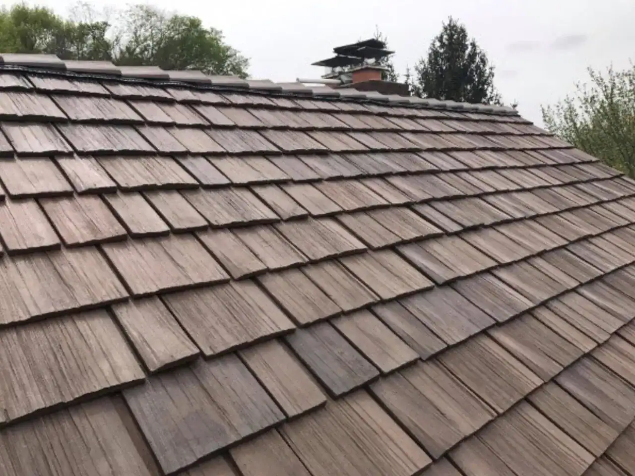 close look of cedar shake type of roofing material