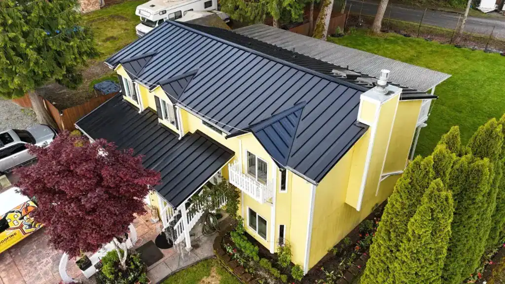 house roof covered with metal roofing material
