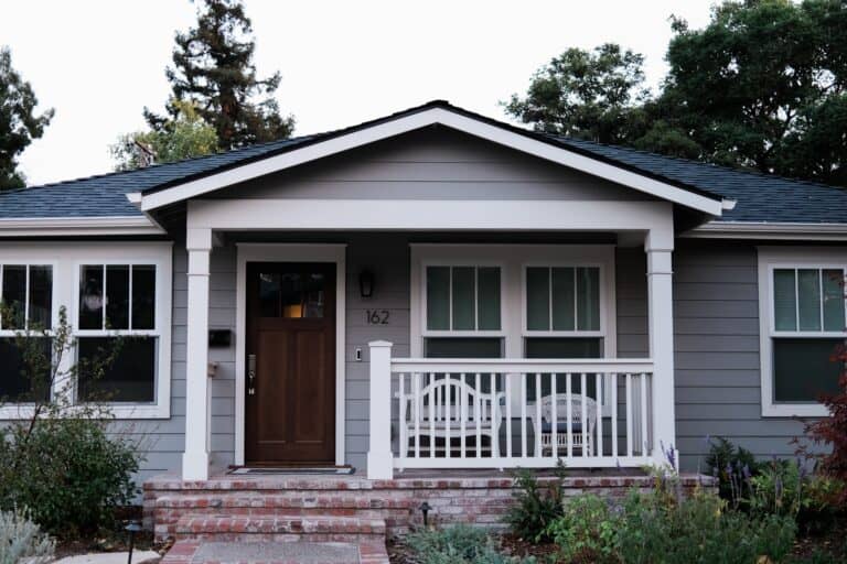 A home with a new roof by Bee Roofing And Exteriors.